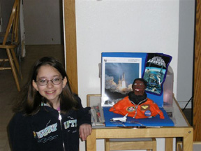 Gina Pardew. Future explorer with a project she did for school---on Mae Jemison-first African/American woman astronaut.