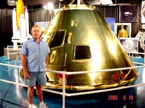 TD Barnes posing with the Apollo space Capsule at Weatherford, Oklahoma