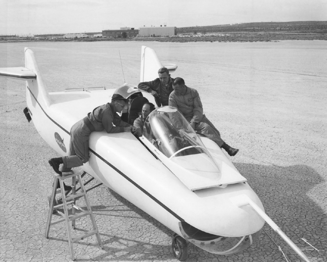 Chuck Yeager, Milt Thompson, Don Malick, and Bruce Peterson with the M2-Fl Lifting Body