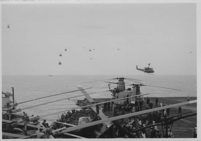 Helos approaching carrier during evacuation of Americans from Saigon