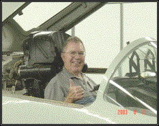 T.D. Barnes posing in a MiG 19 at the Nellis AFB Threat Museum in preparion for tour during 18th Roadrunner reunion